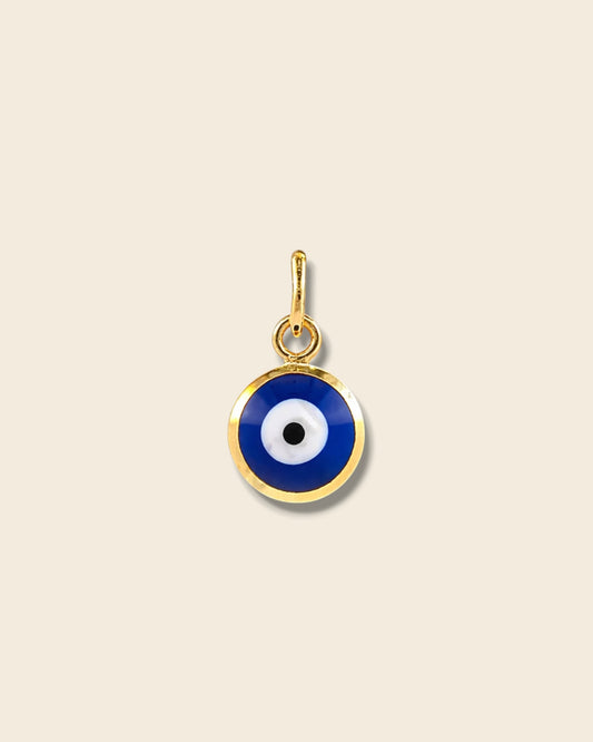 Golden evil eye charm